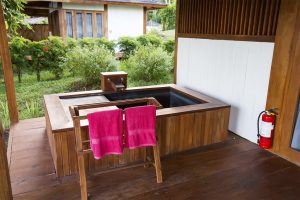 Onsin on verandah of bungalows